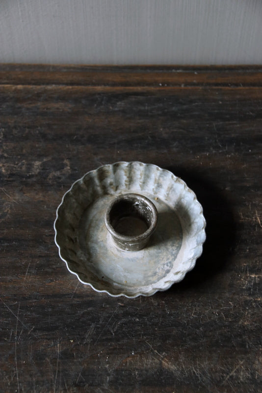 Zinc candlestick cartel