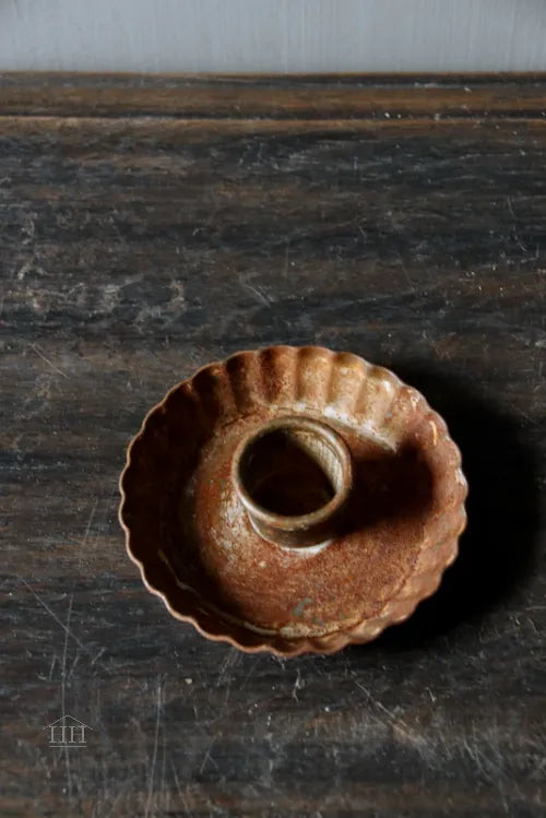 Zinken kandelaar roest kartel