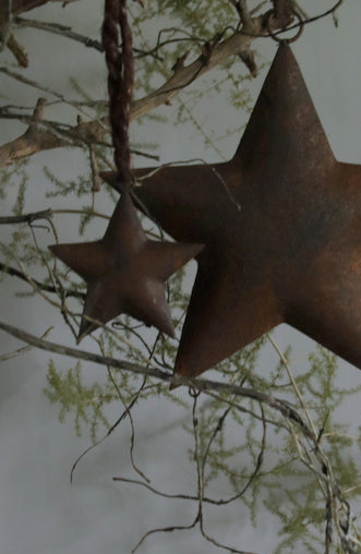 Roestige metalen ster 10 cm