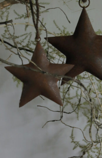 Roestige metalen ster 15 cm