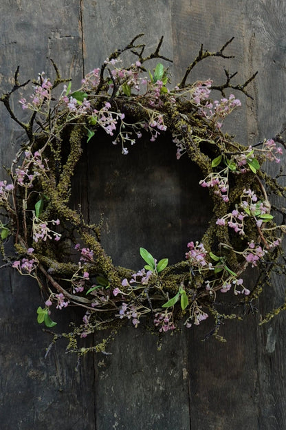 Kunst moskrans met roze gipskruid