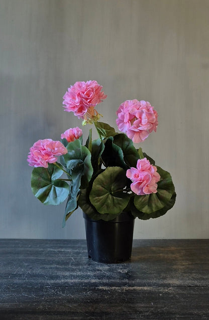 Artificial pink geranium in an inner pot - 33 cm