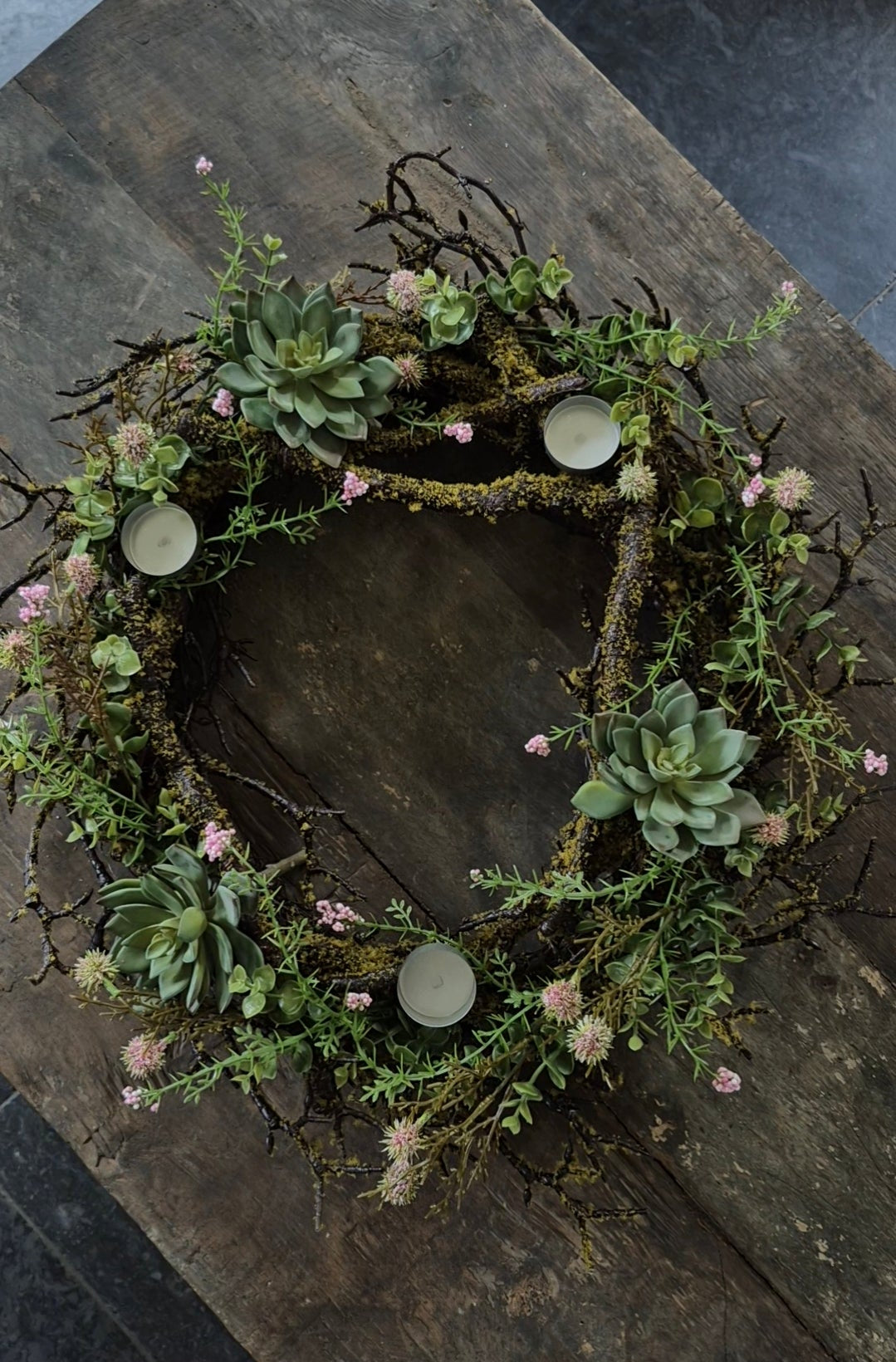 Wreath with moss, pink echinops, succulents and tealight holders 40cm