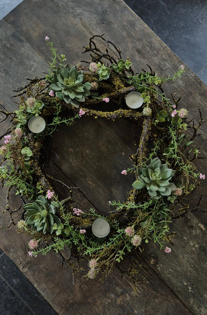 Wreath with moss, pink echinops, succulents and tealight holders 40cm