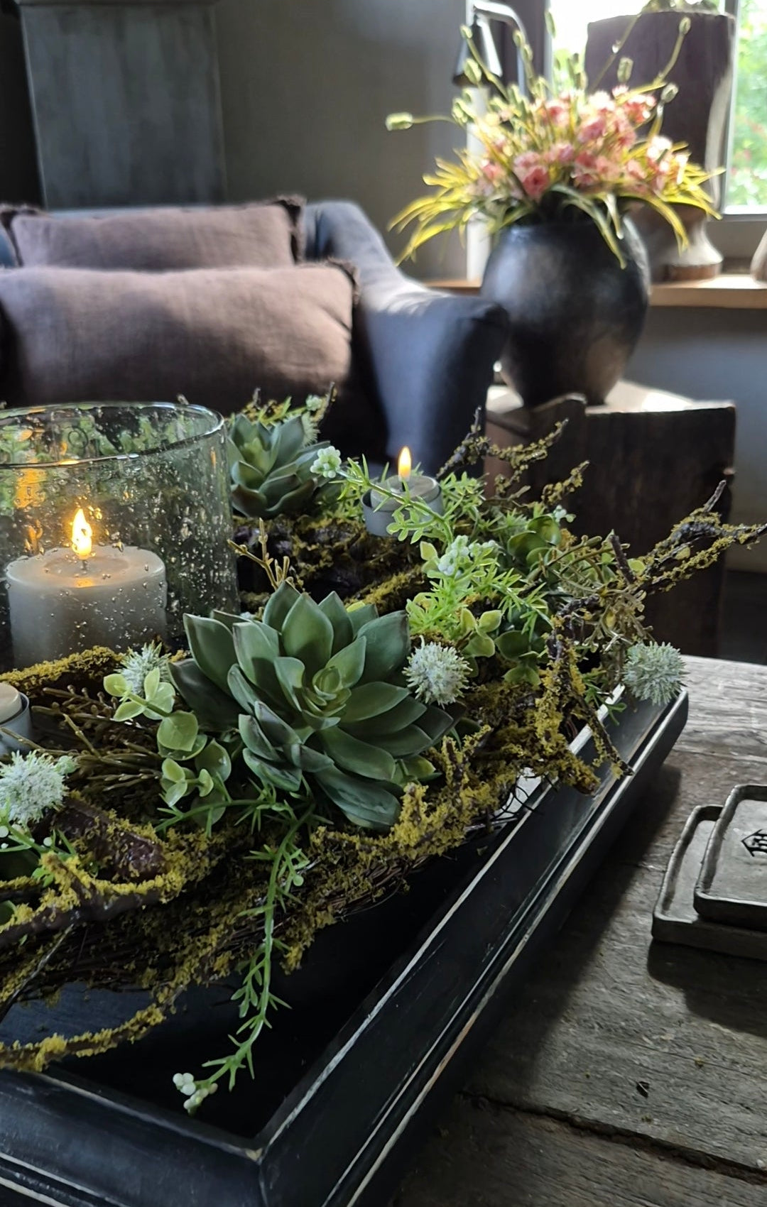 Wreath with moss, white echinops, succulents, and tea light holders 40cm