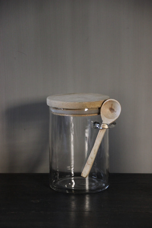 Small storage jar with wooden lid and spoon