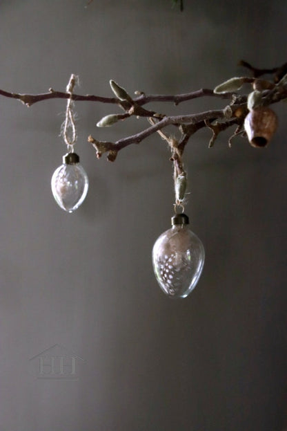 Transparent egg with quail feather M (6 pieces)