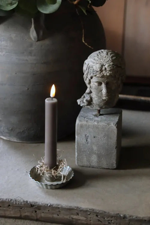 Beeld Eros op blokje