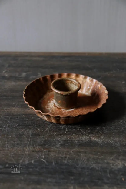 Zinken kandelaar roest kartel