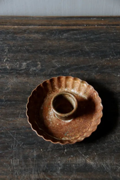 Zinken kandelaar roest kartel