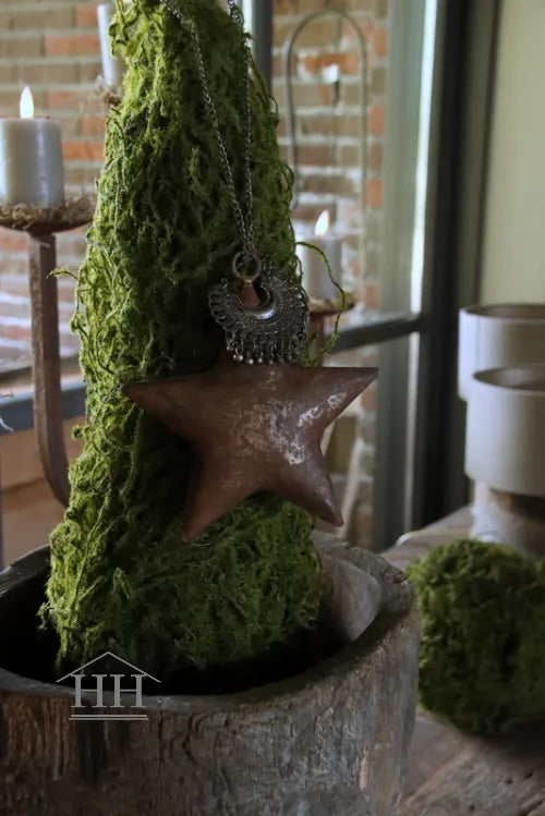 Landelijke kerstdecoratie roestige kerst ster met sieraad